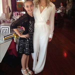 White long sleeve jumpsuit. Good detailing